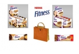 Castiga o geanta de plaja plina cu batoane Nestle Fitness