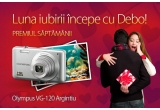 Castiga un aparat foto digital Olympus argintiu