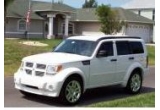 Castiga un autoturism Dodge Nitro