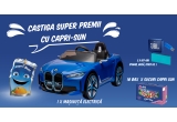 Castiga o mașinuța electrica BMW i4, kituri Capri Sun sau baxuri Capri-Sun